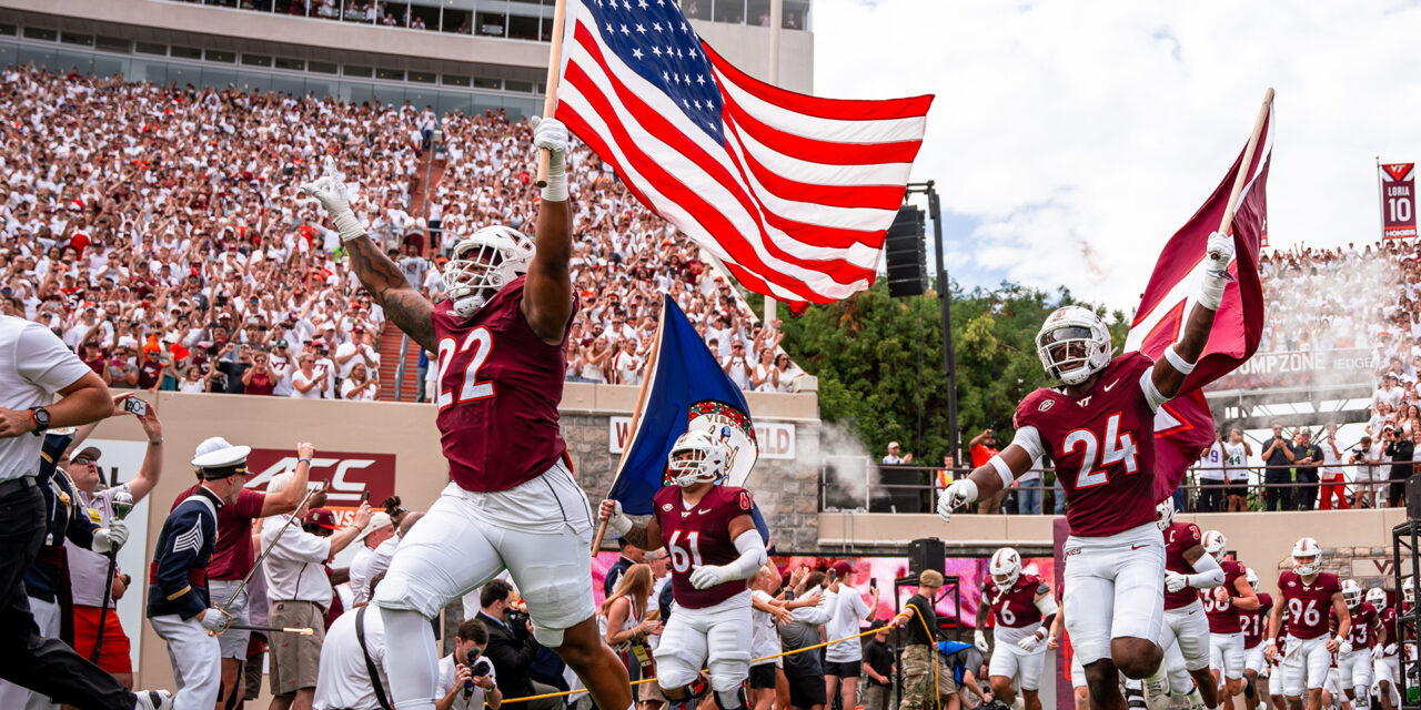 Virginia Tech runs in to Enter Sandman (Rutgers)