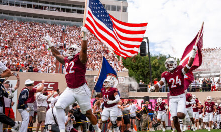 Virginia Tech runs in to Enter Sandman (Rutgers)