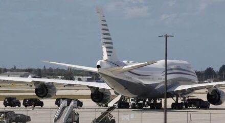 Trump tours a Boeing plane to spotlight delay on getting new Air Force One