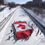 Defiant Canadians mark their flag’s anniversary as Trump hopes to make their country a state