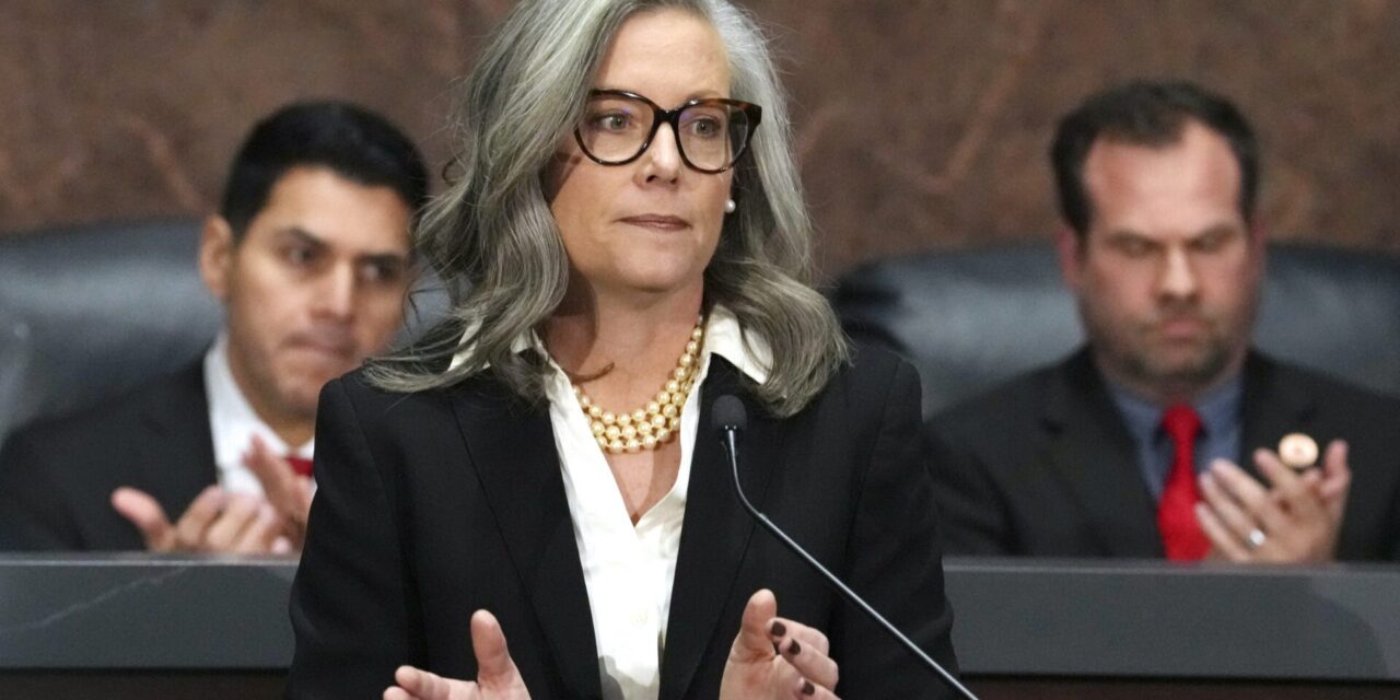 Arizona governor halts bill signing over funding dispute