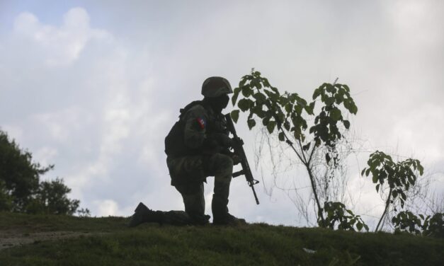 3 Haitian soldiers warring with gangs are slain outside of Port–au-Prince
