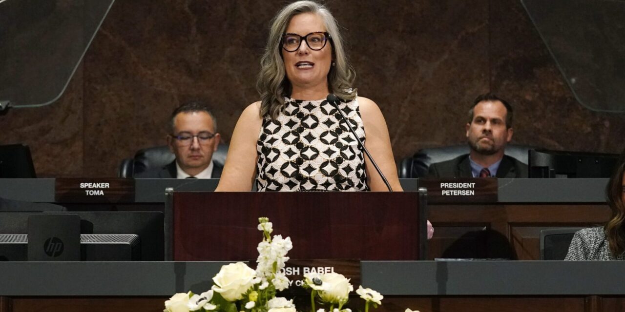 Arizona governor lifts pause to bill signing after funding dispute resolves
