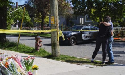 AP PHOTOS: A vehicle plows into a Filipino street festival crowd in Vancouver