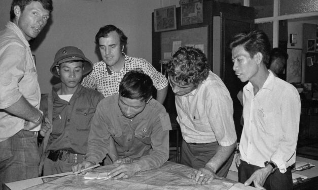 As communist troops streamed into Saigon, a few remaining reporters kept photos and stories flowing