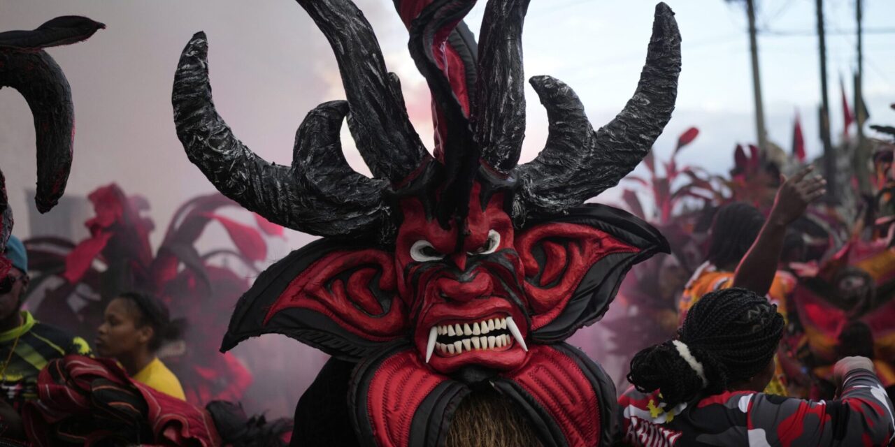 AP PHOTOS: Panama town reckons with dark history of colonialism in Festival of Devils and Congos