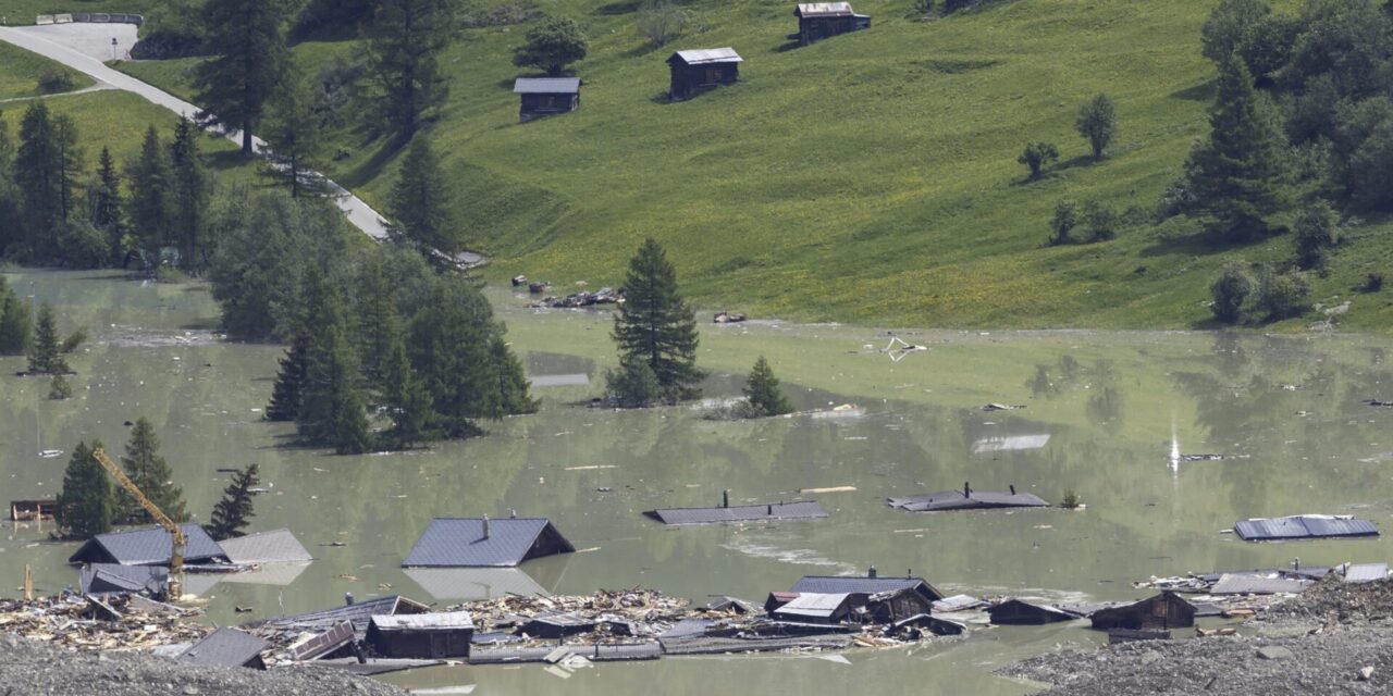 A river dammed by a huge Swiss landslide is flowing again. That’s a relief to authorities