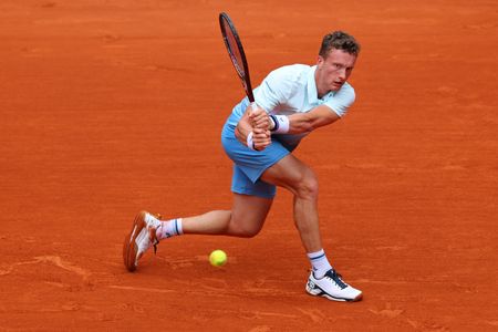 Tennis-Lehecka more than happy to win three games against red-hot Sinner